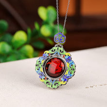 Natural Blood Amber Cloisonné Crafted Lotus Flower Spinning Necklace.