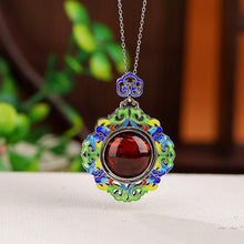 Natural Blood Amber Cloisonné Crafted Lotus Flower Spinning Necklace.